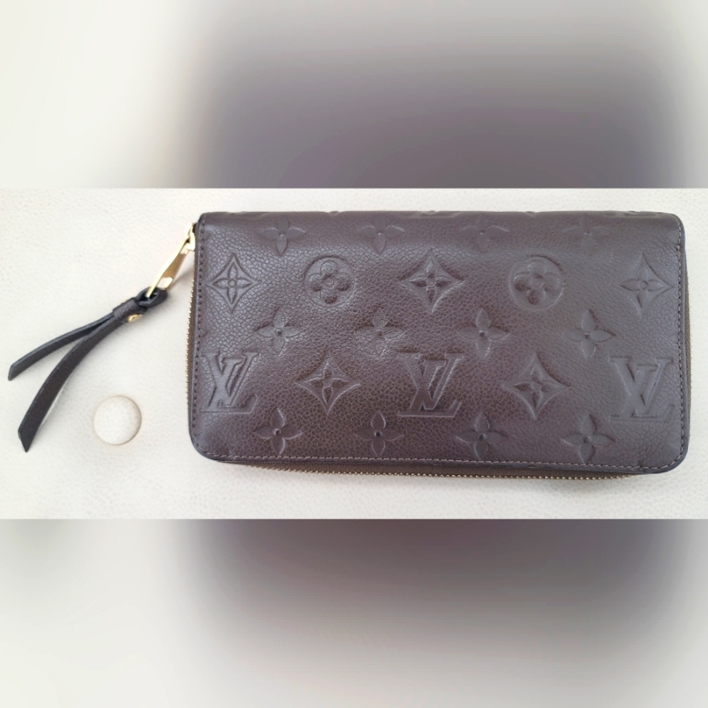 Louis Vuitton Monogram Empreinte Zippy Wallet in brown